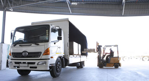 Truck being loaded by Forklift